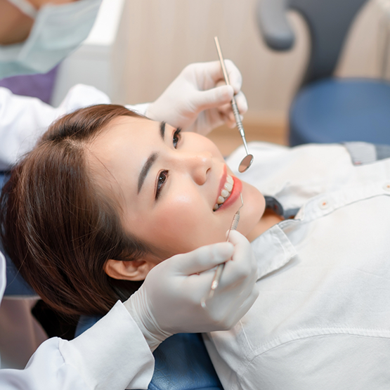 Woman receiving a dental exam