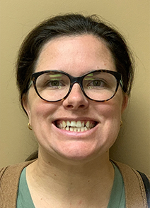 Woman smiling with misaligned teeth